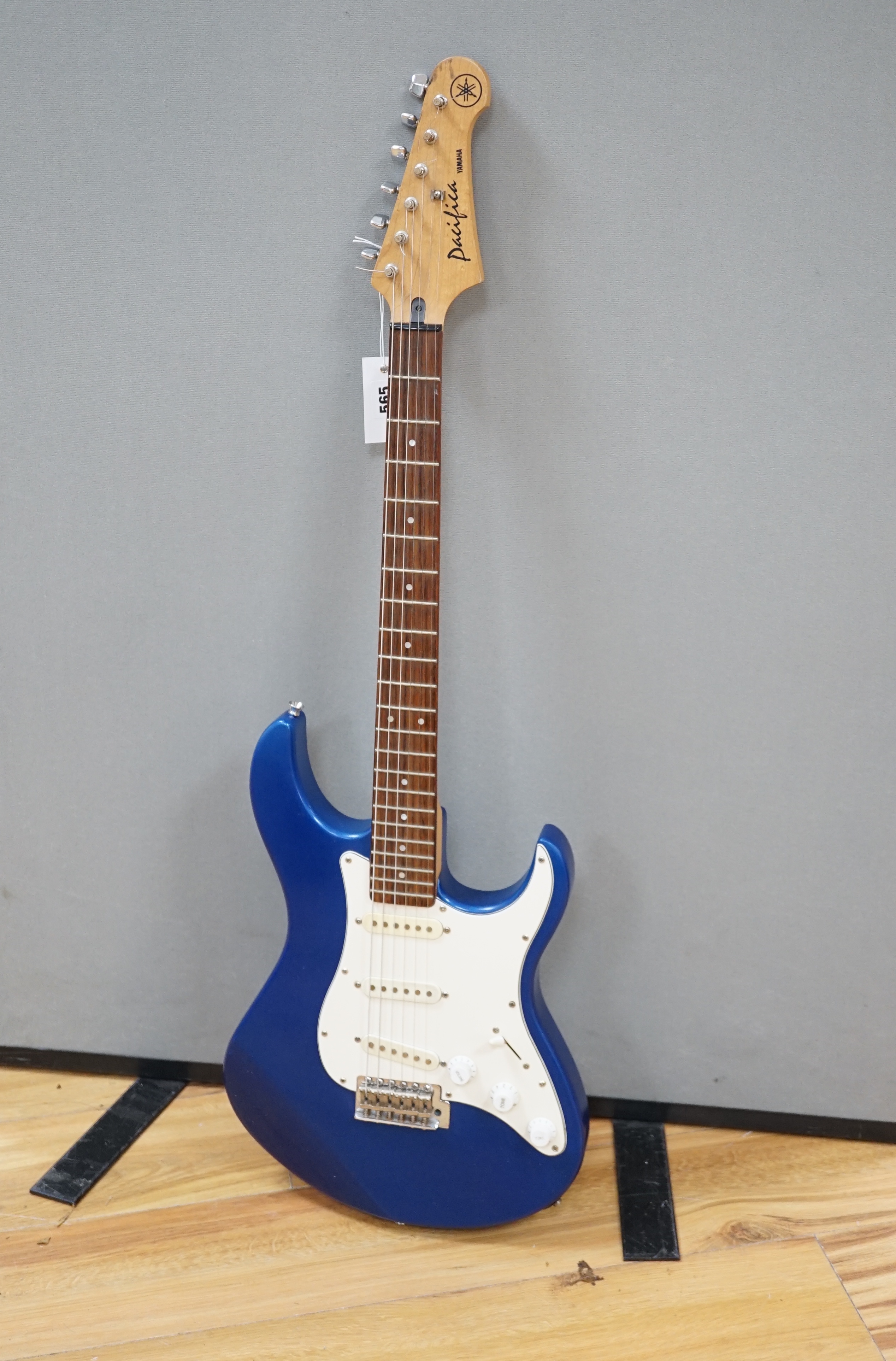 A Yamaha Pacifica electric guitar